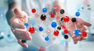 Businessman using modern molecule structure 3D rendering